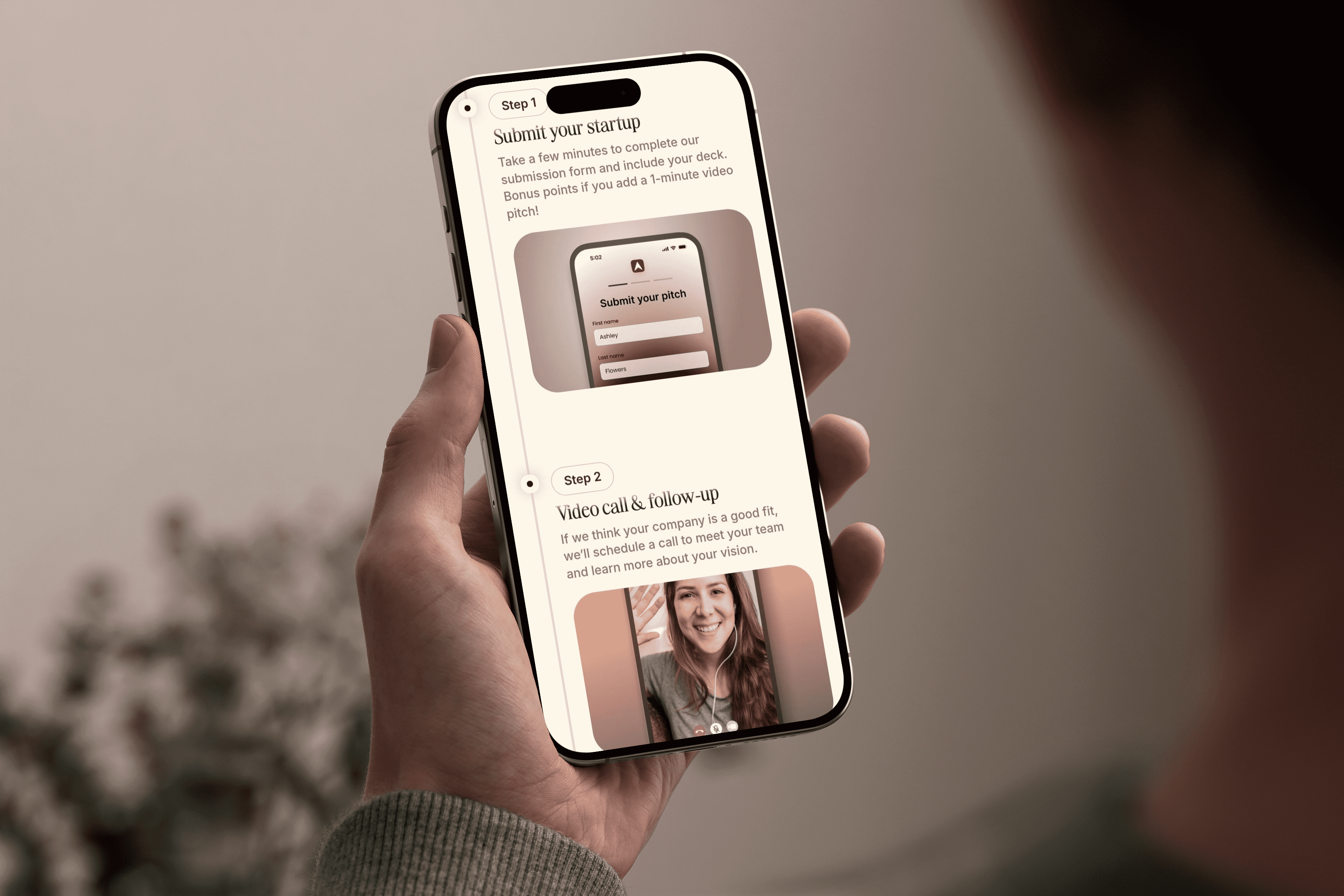 Path Ventures website on a phone held in one hand, showing the process steps: Step 1 Submit your startup and Step 2 Video call and follow-up
